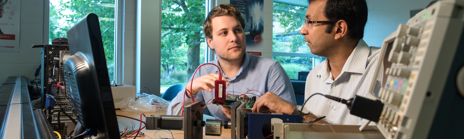 Students Working With a Motherboard